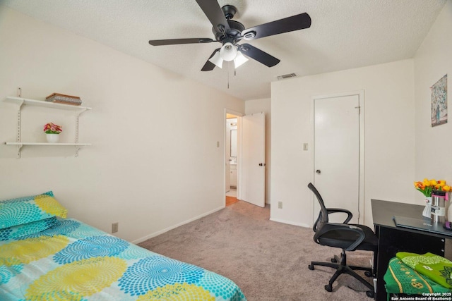 4919 Arbor Rdg, San Antonio, TX 78228 - bedroom with carpet floors, baseboards, a textured ceiling, and ceiling fan
