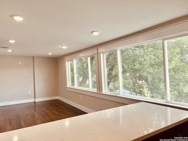 424 Club Dr, San Antonio, TX 78201 - unfurnished room with wood finished floors, baseboards, and recessed lighting