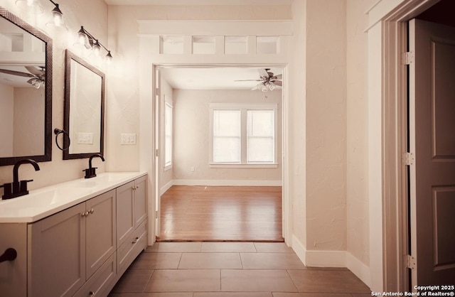 424 Club Dr, San Antonio, TX 78201 - full bathroom with ceiling fan, baseboards, tile patterned floors, and double vanity