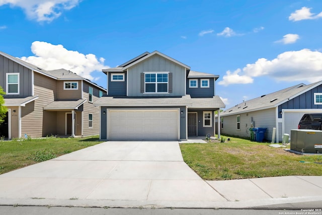 6322 Silver Pegasus, San Antonio, TX 78218 - view of front facade with board and batten siding, an attached garage, a front lawn, and concrete driveway