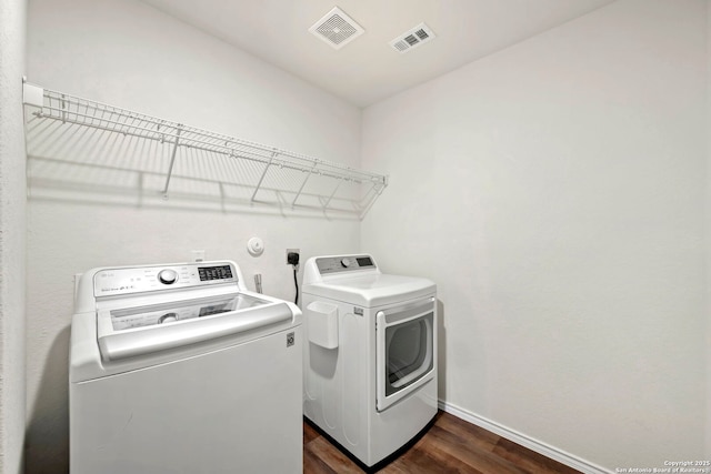 6322 Silver Pegasus, San Antonio, TX 78218 - washroom featuring independent washer and dryer, baseboards, and dark wood-type flooring