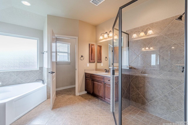 15522 Echo, Selma, TX 78154 - full bathroom featuring a stall shower, vanity, a bath, tile patterned flooring, and baseboards