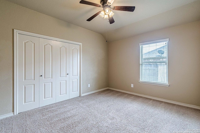 15522 Echo, Selma, TX 78154 - unfurnished bedroom featuring carpet flooring, a closet, a ceiling fan, baseboards, and vaulted ceiling