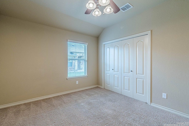 15522 Echo, Selma, TX 78154 - unfurnished bedroom featuring carpet flooring, a closet, baseboards, ceiling fan, and vaulted ceiling
