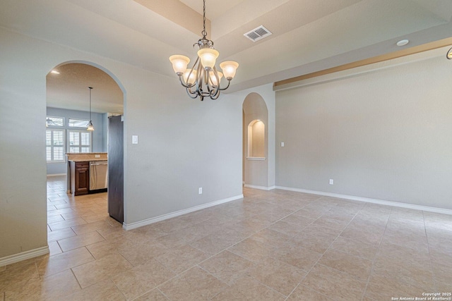 15522 Echo, Selma, TX 78154 - spare room featuring arched walkways, a chandelier, and baseboards