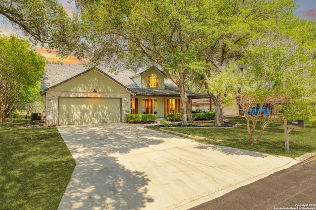 9114 Oak Downs Dr, San Antonio, TX 78230 - traditional-style home with covered porch, a garage, a front yard, driveway, and central AC