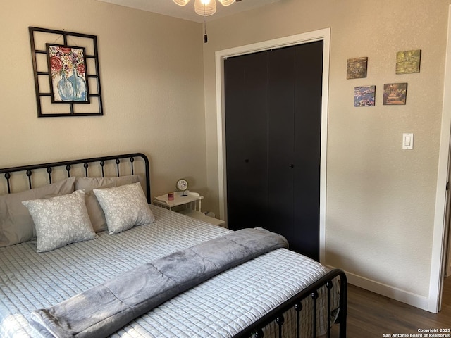 326 Riverview, Mcqueeney, TX 78123 - bedroom featuring baseboards, wood finished floors, and a closet