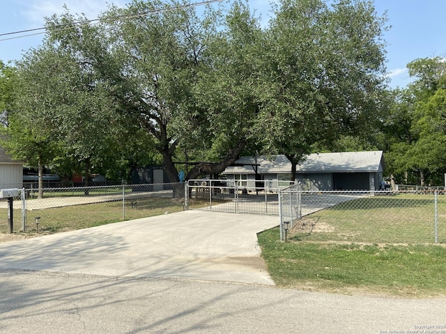 326 Riverview, Mcqueeney, TX 78123 - view of front of house with driveway and a gate