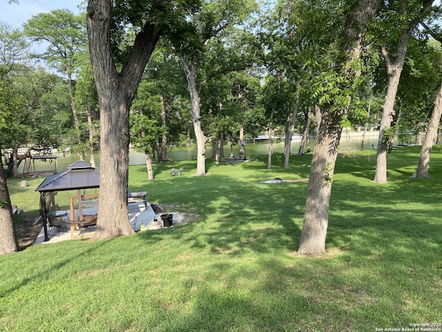 326 Riverview, Mcqueeney, TX 78123 - view of green lawn featuring a gazebo and a water view