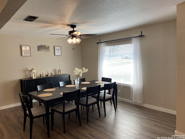 326 Riverview, Mcqueeney, TX 78123 - dining area with dark wood finished floors, ceiling fan, a textured ceiling, and baseboards