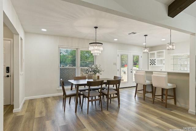 430 Yosemite Dr, San Antonio, TX 78232 - dining space featuring recessed lighting, wood finished floors, baseboards, a chandelier, and french doors