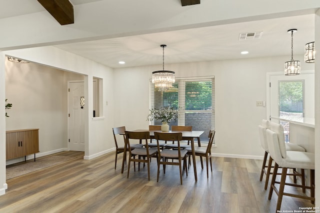 430 Yosemite Dr, San Antonio, TX 78232 - dining room with a chandelier, wood finished floors, plenty of natural light, baseboards, and recessed lighting