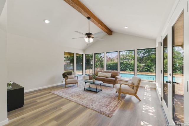 430 Yosemite Dr, San Antonio, TX 78232 - living room with beam ceiling, wood finished floors, a ceiling fan, high vaulted ceiling, and baseboards