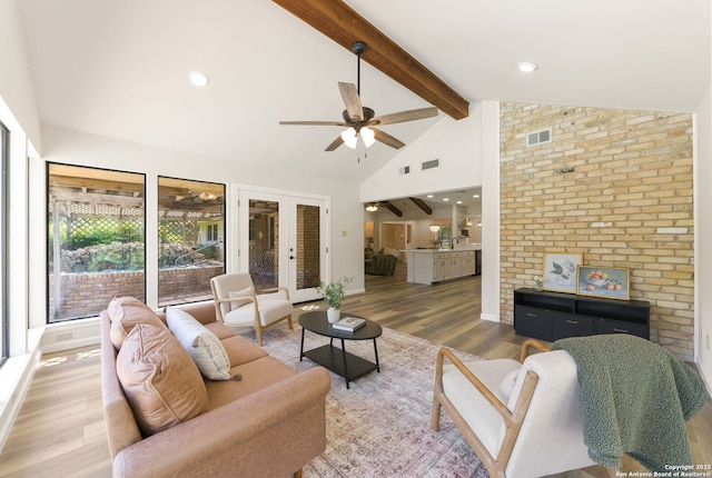 430 Yosemite Dr, San Antonio, TX 78232 - living area featuring a ceiling fan, wood finished floors, beam ceiling, and high vaulted ceiling