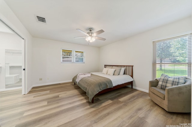 430 Yosemite Dr, San Antonio, TX 78232 - bedroom with light wood-style floors, baseboards, and ceiling fan