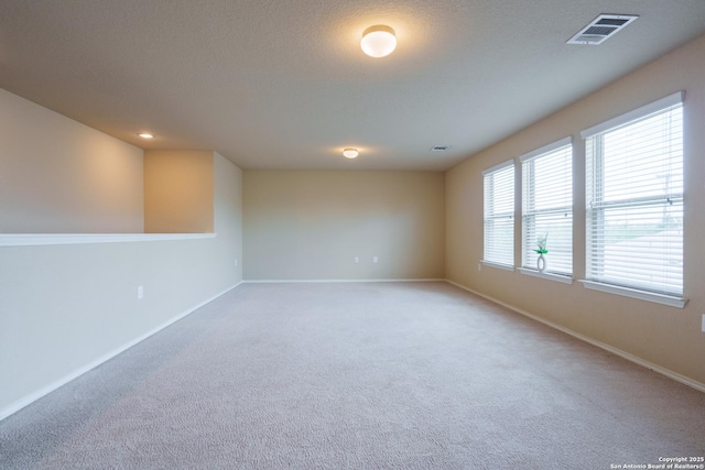 11607 Pelican Pass, San Antonio, TX 78221 - empty room with carpet flooring and baseboards