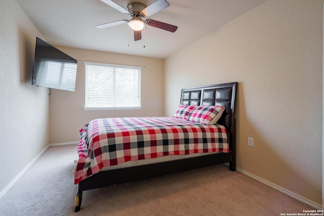 11607 Pelican Pass, San Antonio, TX 78221 - bedroom with carpet, baseboards, and ceiling fan