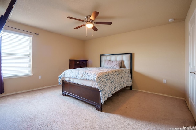 11607 Pelican Pass, San Antonio, TX 78221 - bedroom featuring carpet, baseboards, and a ceiling fan