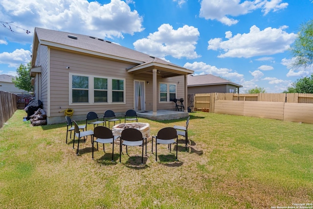 11607 Pelican Pass, San Antonio, TX 78221 - rear view of property with a fire pit and a patio area