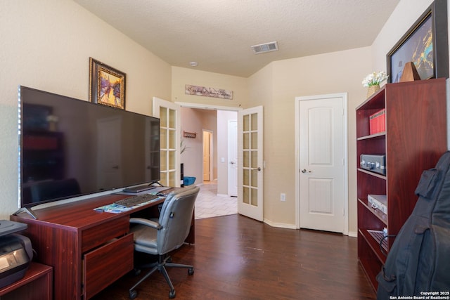 11607 Pelican Pass, San Antonio, TX 78221 - office space featuring french doors, wood finished floors, a textured ceiling, and baseboards