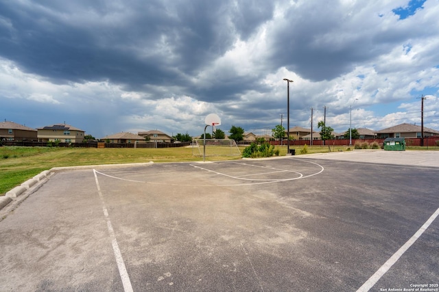 11607 Pelican Pass, San Antonio, TX 78221 - view of basketball court with community basketball court and a residential view
