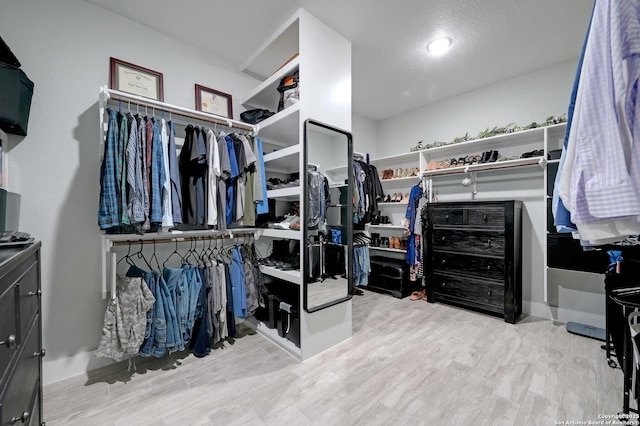 149 Chisum Ln, Vernia, TX 78121 - walk in closet featuring wood finished floors