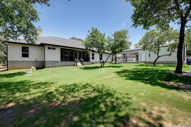149 Chisum Ln, Vernia, TX 78121 - rear view of property with a chimney and stucco siding
