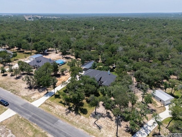 149 Chisum Ln, Vernia, TX 78121 - drone / aerial view of a heavily wooded area