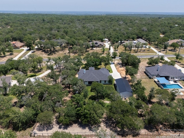 149 Chisum Ln, Vernia, TX 78121 - bird's eye view of a forest and a pool area