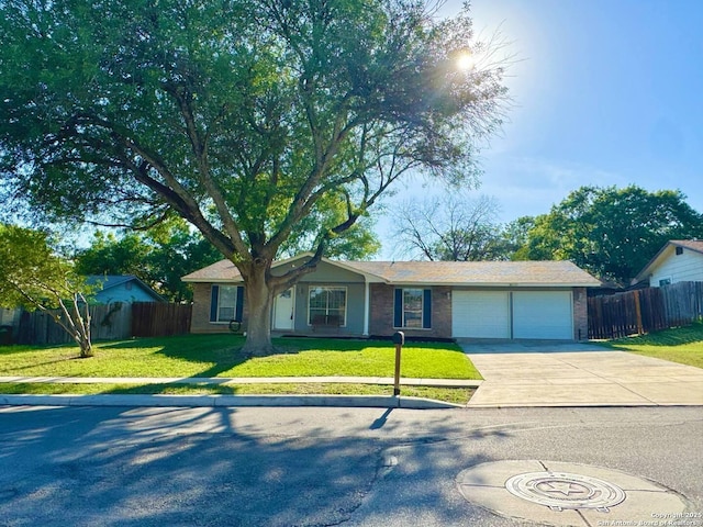1303 Billings Dr, San Antonio, TX 78245 - single story home with a garage, concrete driveway, and brick siding
