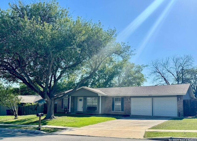 1303 Billings Dr, San Antonio, TX 78245 - single story home with an attached garage, concrete driveway, and brick siding