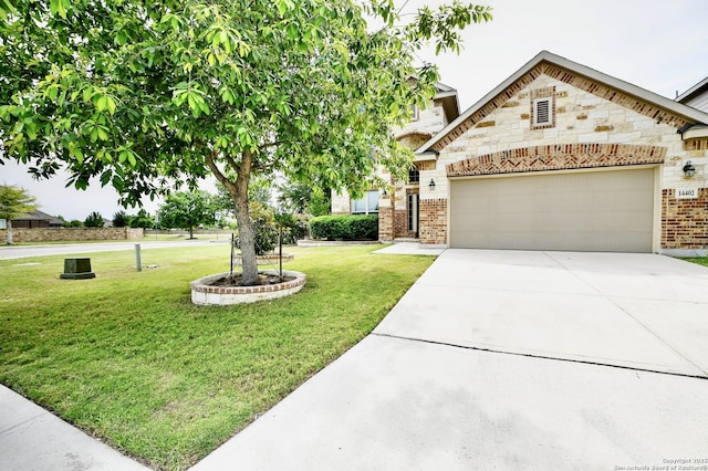 14402 Palomino Pl, San Antonio, TX 78254 - view of front of house featuring brick siding, an attached garage, driveway, a front lawn, and stone siding