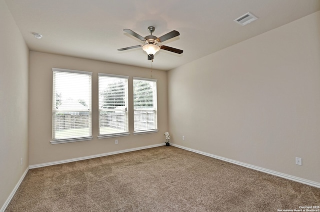 14402 Palomino Pl, San Antonio, TX 78254 - carpeted empty room with ceiling fan, baseboards, and a smoke detector
