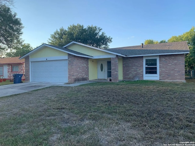 5135 Tom Stafford, Kirby, TX 78219 - ranch-style home with an attached garage, brick siding, a front yard, and concrete driveway