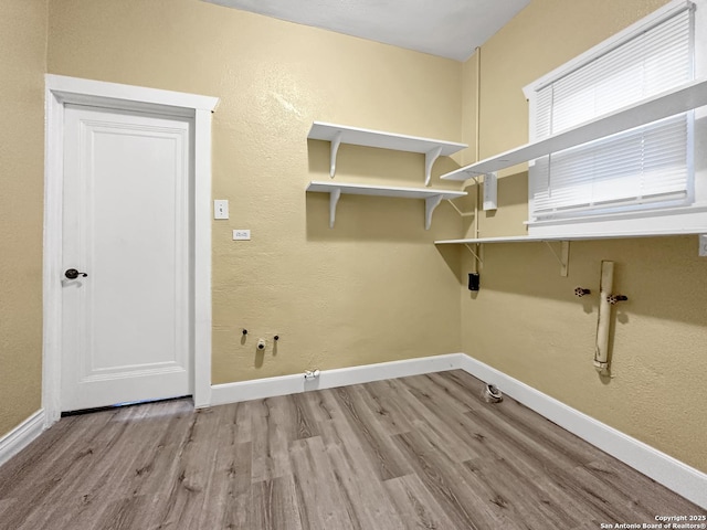 1806 W Magnolia, San Antonio, TX 78201 - clothes washing area featuring hookup for a gas dryer, wood finished floors, baseboards, and washer hookup