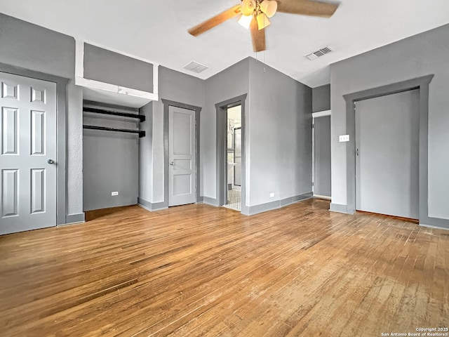 1806 W Magnolia, San Antonio, TX 78201 - unfurnished bedroom featuring hardwood / wood-style flooring, a ceiling fan, and baseboards