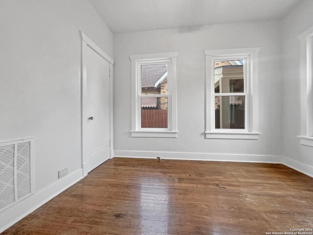 1806 W Magnolia, San Antonio, TX 78201 - unfurnished room with wood finished floors and baseboards