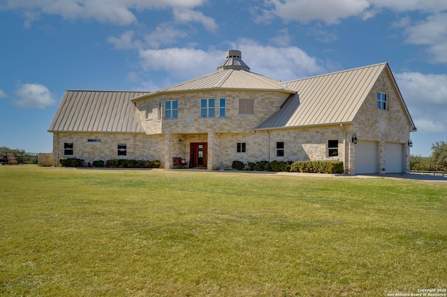 24005 Pedernales Canyon Trl, Spicewood, TX 78669 - view of front of property featuring stone siding, a front lawn, a standing seam roof, and metal roof