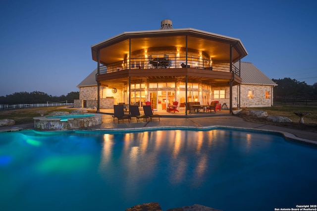 24005 Pedernales Canyon Trl, Spicewood, TX 78669 - view of swimming pool featuring a patio area, fence, and a pool with connected hot tub