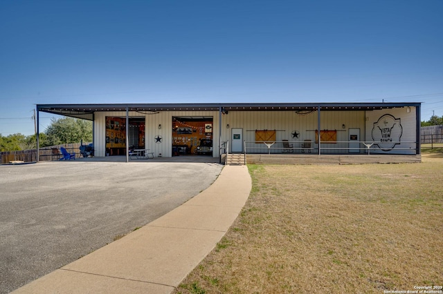 24005 Pedernales Canyon Trl, Spicewood, TX 78669 - view of front of house featuring a garage