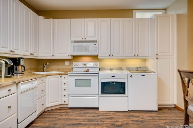 24005 Pedernales Canyon Trl, Spicewood, TX 78669 - kitchen featuring white appliances, washing machine and dryer, a sink, and white cabinetry