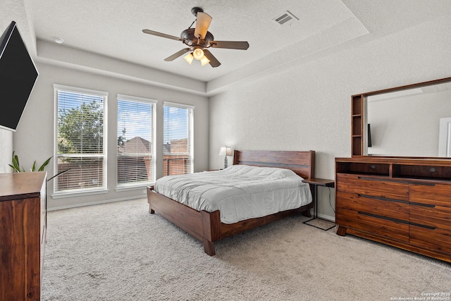 2126 Elysian, San Antonio, TX 78253 - bedroom featuring carpet, a raised ceiling, and a ceiling fan