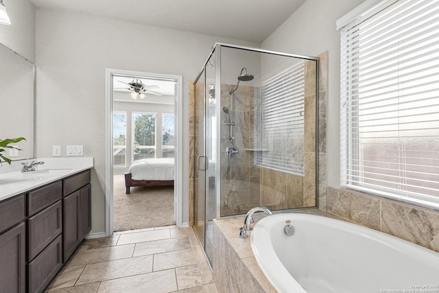 2126 Elysian, San Antonio, TX 78253 - ensuite bathroom with a bath, a shower stall, double vanity, and ceiling fan