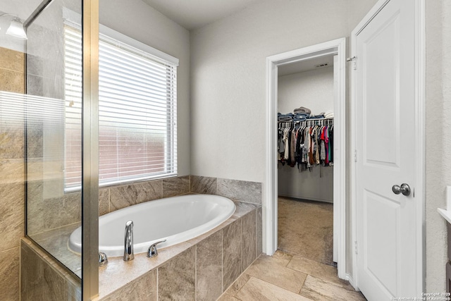 2126 Elysian, San Antonio, TX 78253 - full bath with a garden tub, tiled shower, and a walk in closet