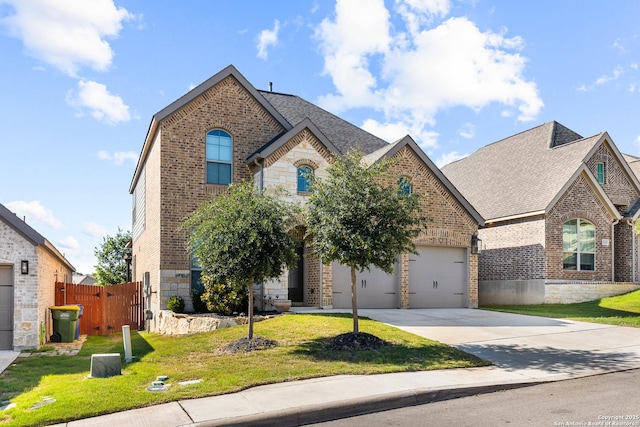 2126 Elysian, San Antonio, TX 78253 - french provincial home featuring brick siding, concrete driveway, stone siding, and a shingled roof