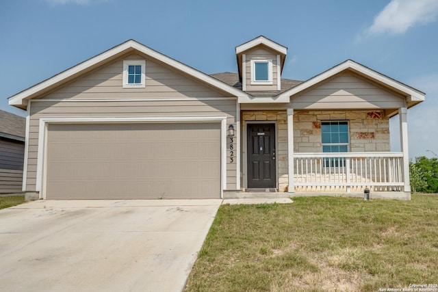 3823 Casado, Converse, TX 78109 - view of front of home with covered porch, driveway, stone siding, and a front yard