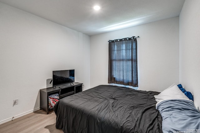 3823 Casado, Converse, TX 78109 - bedroom with light wood finished floors and baseboards