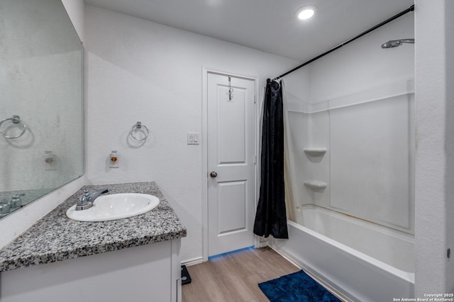 3823 Casado, Converse, TX 78109 - bathroom with wood finished floors, vanity, and shower / bath combo
