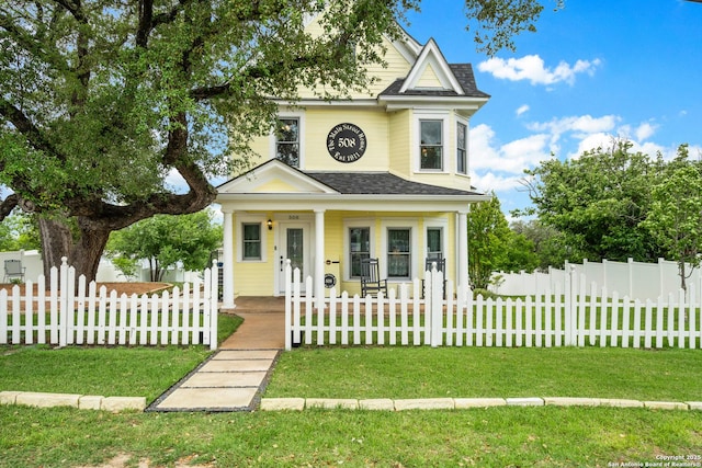 508 Main, Marble Falls, TX 78654 - victorian home featuring a porch and roof with shingles