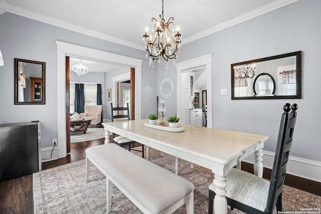 508 Main, Marble Falls, TX 78654 - dining area with a chandelier, wood finished floors, crown molding, and baseboards